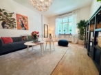 Echte Fotos, schöne 2-Zimmer-Wohnung mit gepflegtem Innenhof zu verkaufen - Wohnzimmer